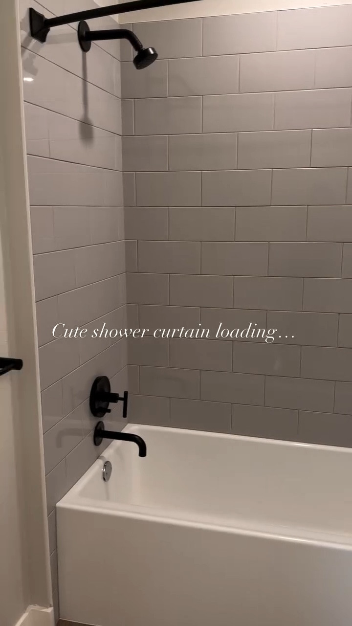Bathroom refresh loading… 🖤✨ Adding a neutral shower curtain is the easiest way to soften gray tile and matte black fixtures. Linking the shower curtain options here on LTK for an easy, renter-friendly upgrade.