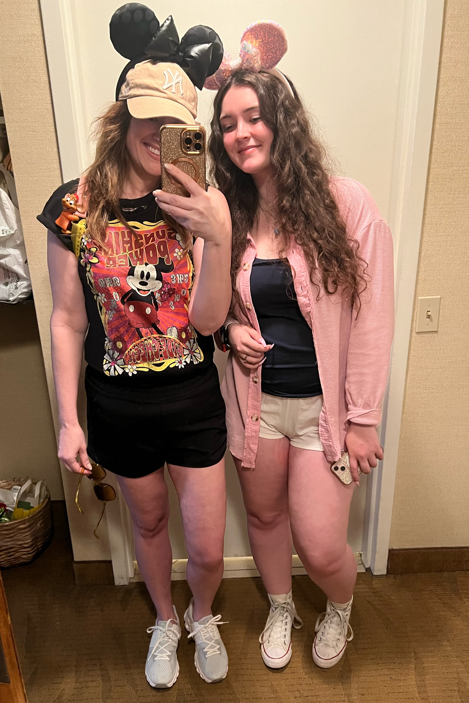 What I wore to Disney day 1, Lululemon athletic shorts, Walmart Mickey Mouse Disney shirt and on cloud sneakers. nY baseball cap and black on black Minnie ears with bow . Teen Disney outfit : aerie shorts, tank top, free people pink Shacket and converse high tops  

#LTKtravel #LTKunder50 #LTKFind