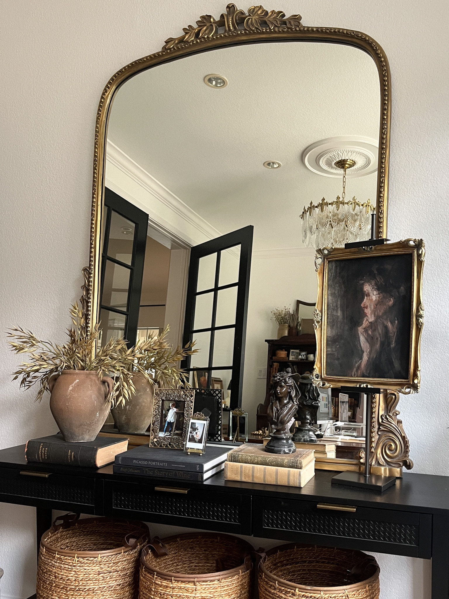 Living room console table styling
Moody decor 

#LTKhome #LTKstyletip #LTKSeasonal