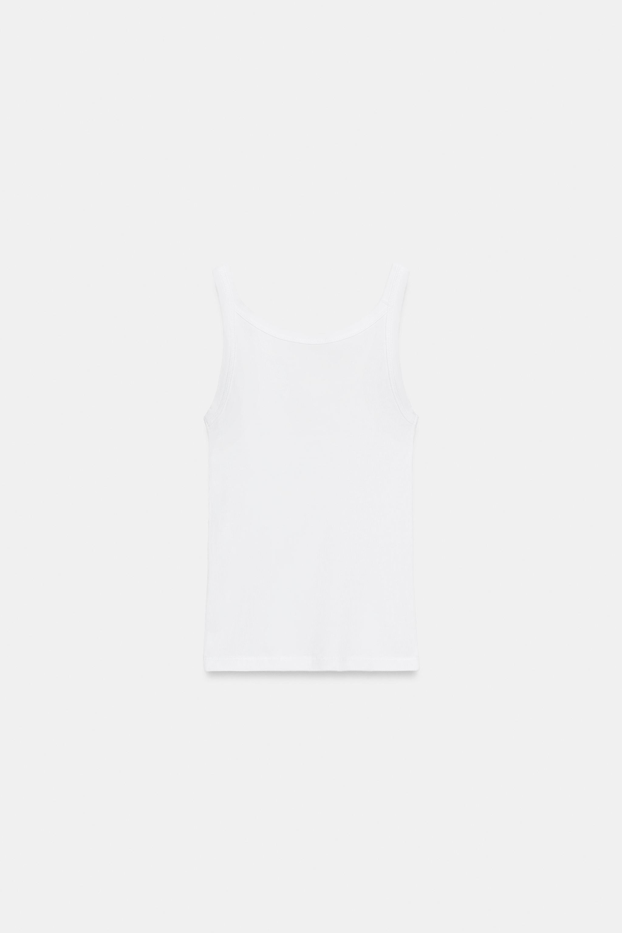 Top with main fabric made of 100% cotton. Round neckline and thin straps. | Zara US