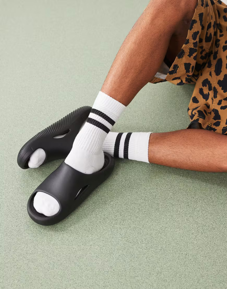 Crocs Mellow slides in black | ASOS (Global)