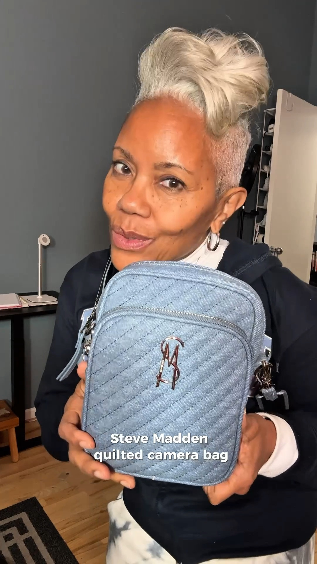 Add a touch of modern elegance with this quilted crossbody bag from Steve Madden. It's adorned with distinctive logo hardware that enhances its sleek design. The compact silhouette is complemented by a secure zip closure and interior pockets for organization.
Product Details

• Zip closure
• Adjustable strap with 23'' drop
• Exterior: SM logo plate, front zipper pocket
• Interior: back wall zip pocket, interior front wall slip pocket
• Imported
Product Specifications

• 6.25" L x 1.75" D x 8.25" H
Material & Care

• Polyurethane
• Clean with a damp cloth or soft brush