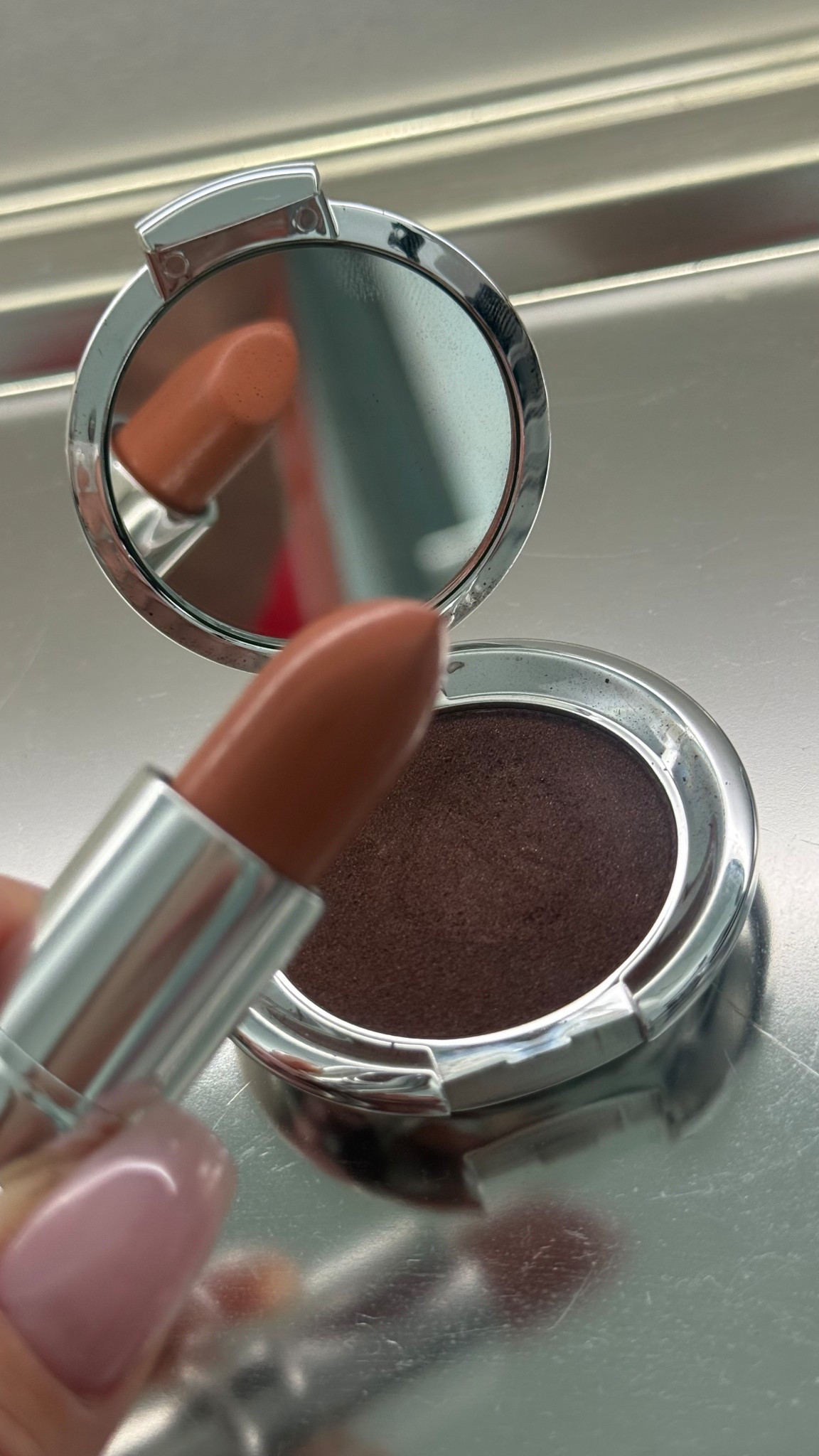 This nude lipstick and eyeshadow combo is amazing. The lipstick glides on and has a smooth texture while the eyeshadow is rich and pigmented to you the perfect smoky eye. You can also use it white or dry for a liner. 
@Nude Envie 

#LTKWorkwear #LTKOver40 #LTKgrwm