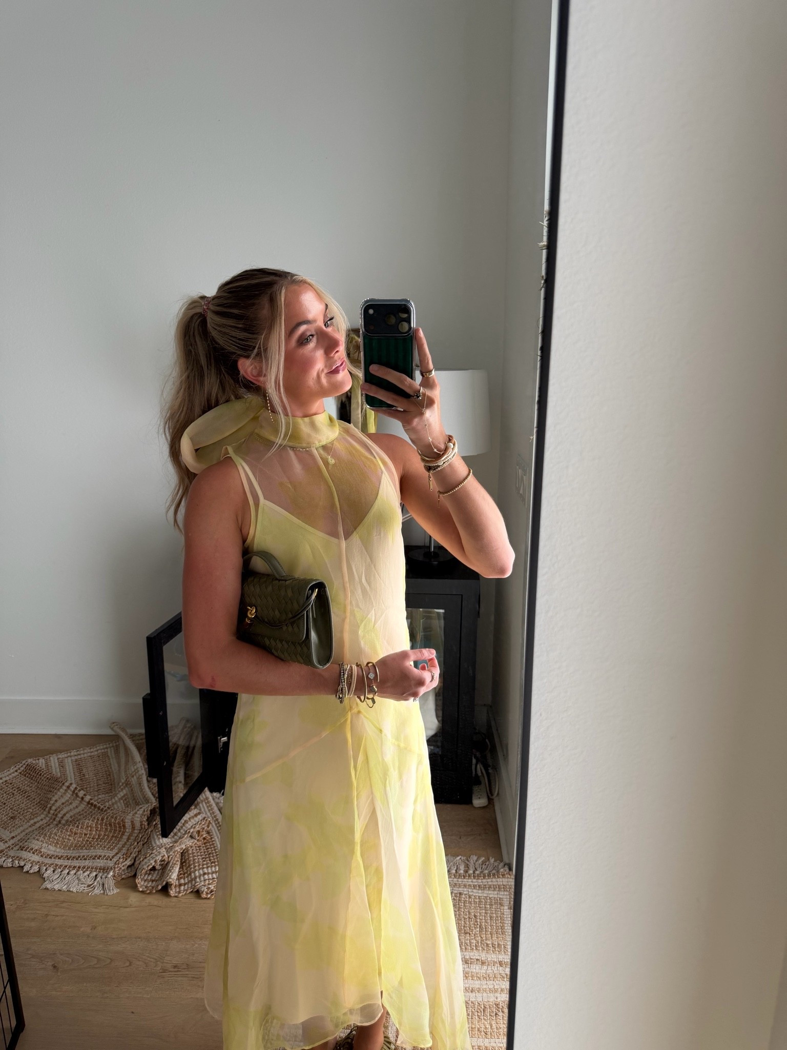 kept this dress in my closet for the perfect outfit I’m obsessed with the yellow and this is a staple Staud dress that comes in so many colors for holidays, wedding guest, etc | my @renttherunway code is RTRXSVOSEN50. 

#whatiwore #ootd #outfitofthenight #weddingguestdress #formaldress @STAUD @dillards @renttherunway