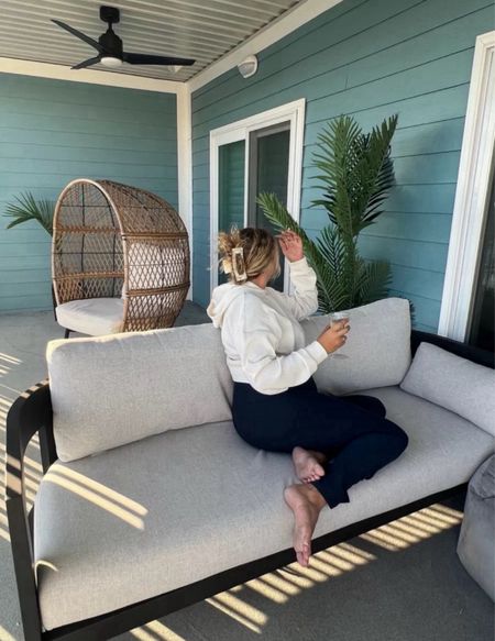 This patio might be my favorite place! Patio furniture, outdoor furniture, casual outfit, loungewear, alo yoga, beyond yoga, costa farms, outdoor plants, patio couch, patio chair, wicker outdoor chair

#LTKHome #LTKFamily #LTKSeasonal