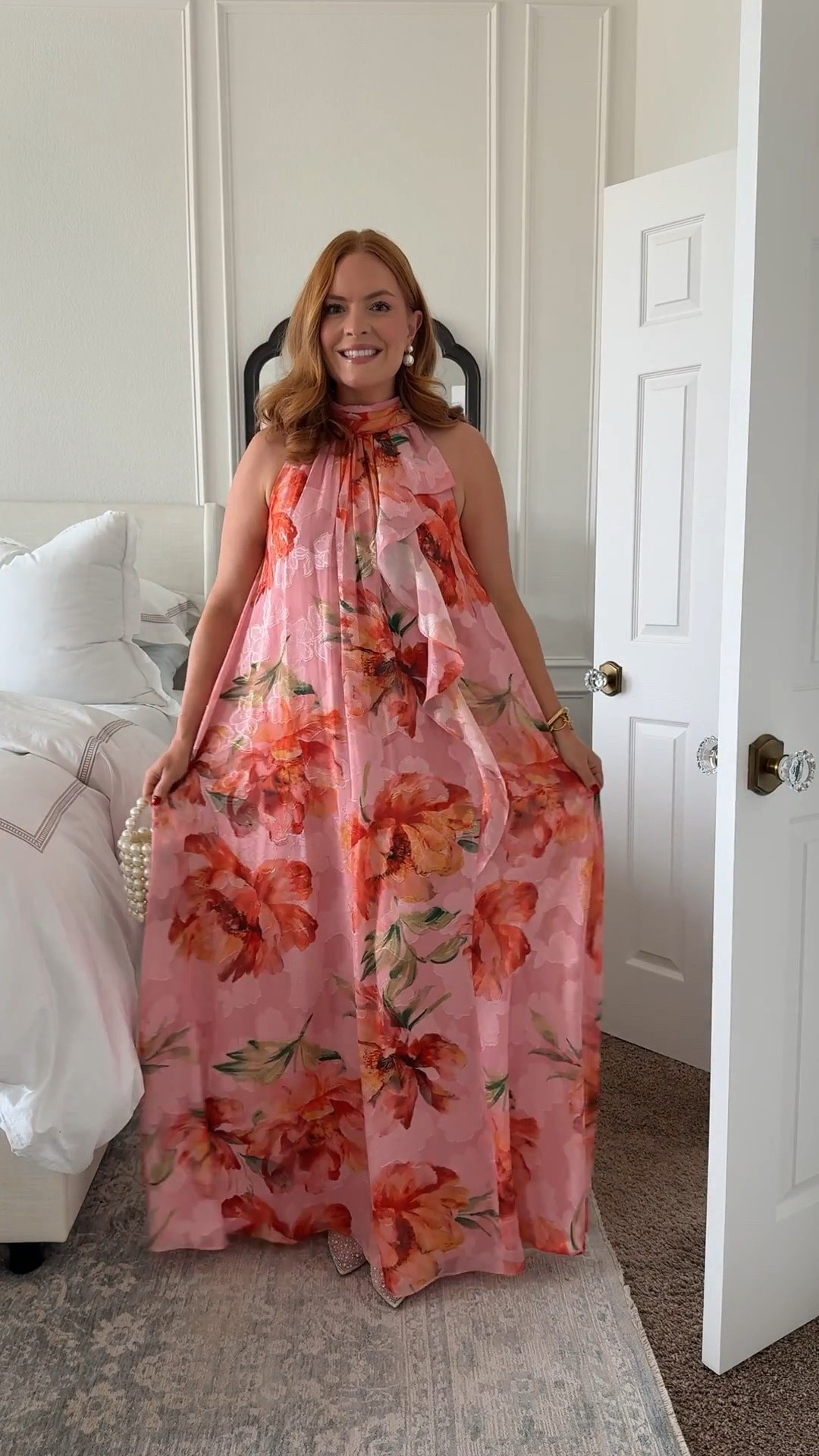 This pink floral maxi wedding guest dress is such a beautiful option for spring and summer weddings. The halter neckline and flowy silhouette make it ideal for outdoor weddings, beach weddings, or daytime ceremonies.

If you’re searching for a floral wedding guest dress for spring, this one is lightweight, comfortable, and so flattering.

Sizing: Wearing a size 4. True to size with an easy, relaxed fit through the skirt. Perfect with heels or dressy sandals.

floral wedding guest dress, pink maxi dress for wedding, spring wedding outfit for women, halter wedding guest dress

#LTKgrwm #LTKWedding #LTKmomlife