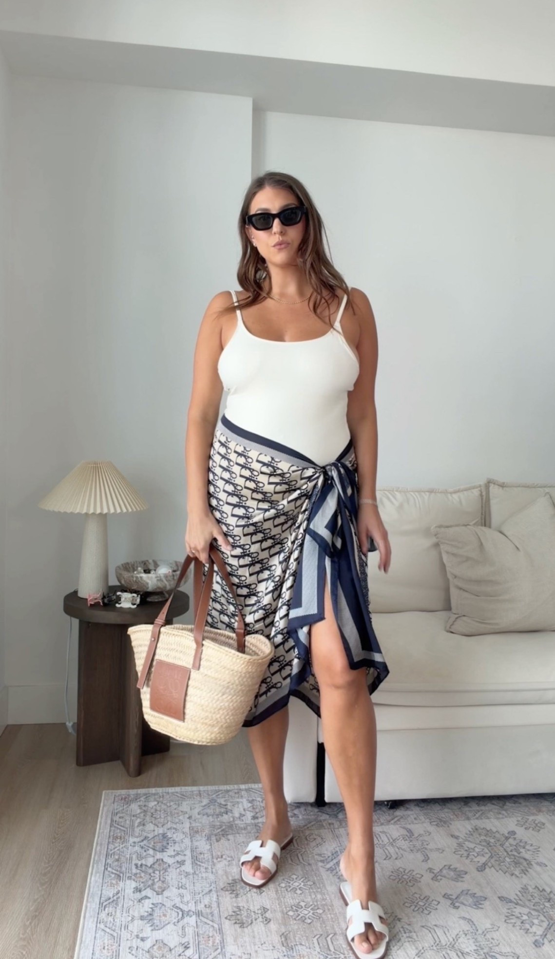 Coastal chic with a designer-inspired twist 🌊🤍

sarong outfit, resort wear, beach vacation outfit, swim cover up, coastal style, summer vacation look, designer inspired outfit, neutral outfit, beach essentials, straw tote bag, white sandals, poolside style, tropical vacation outfit, vacation fashion, summer travel style

#LTKSwim #LTKTravel #LTKMidsize