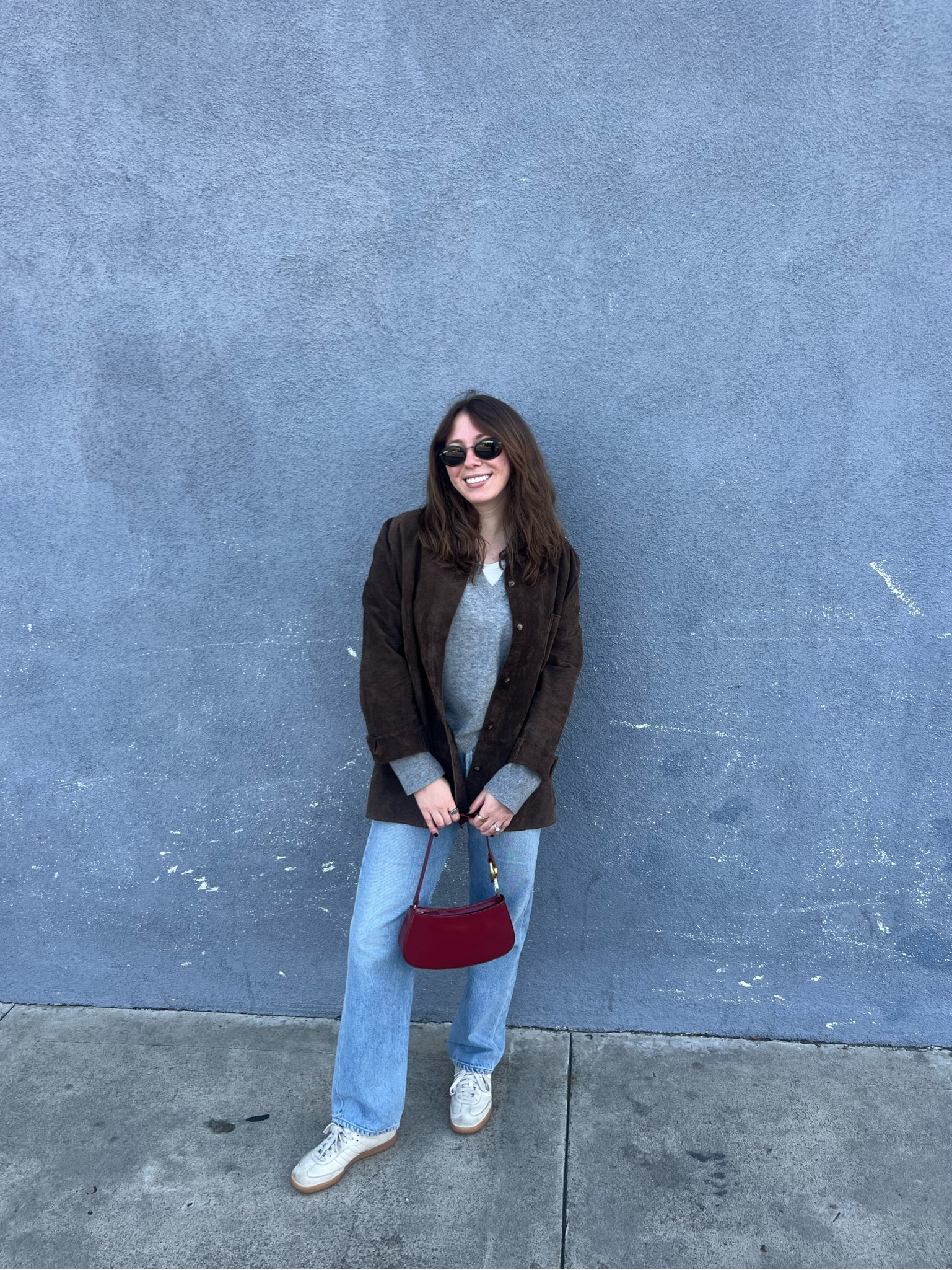 Latest Jenni Kayne convert 🙋🏻‍♀️ the yummiest cashmere sweater I have had in a long time. Opted for classic, timeless gray! Paired with  vintage suede jacket, jeans and sambas + my new fave bag from Staud. I’m obsessed with the color because it’s great for the holidays but not too red where you can’t wear it throughout the year. Jacket is vintage so linking similar at various price points. Also cannot find a match for the bag so linking it in diff festive colors ✨

#LTKitbag #LTKmidsize #LTKSeasonal