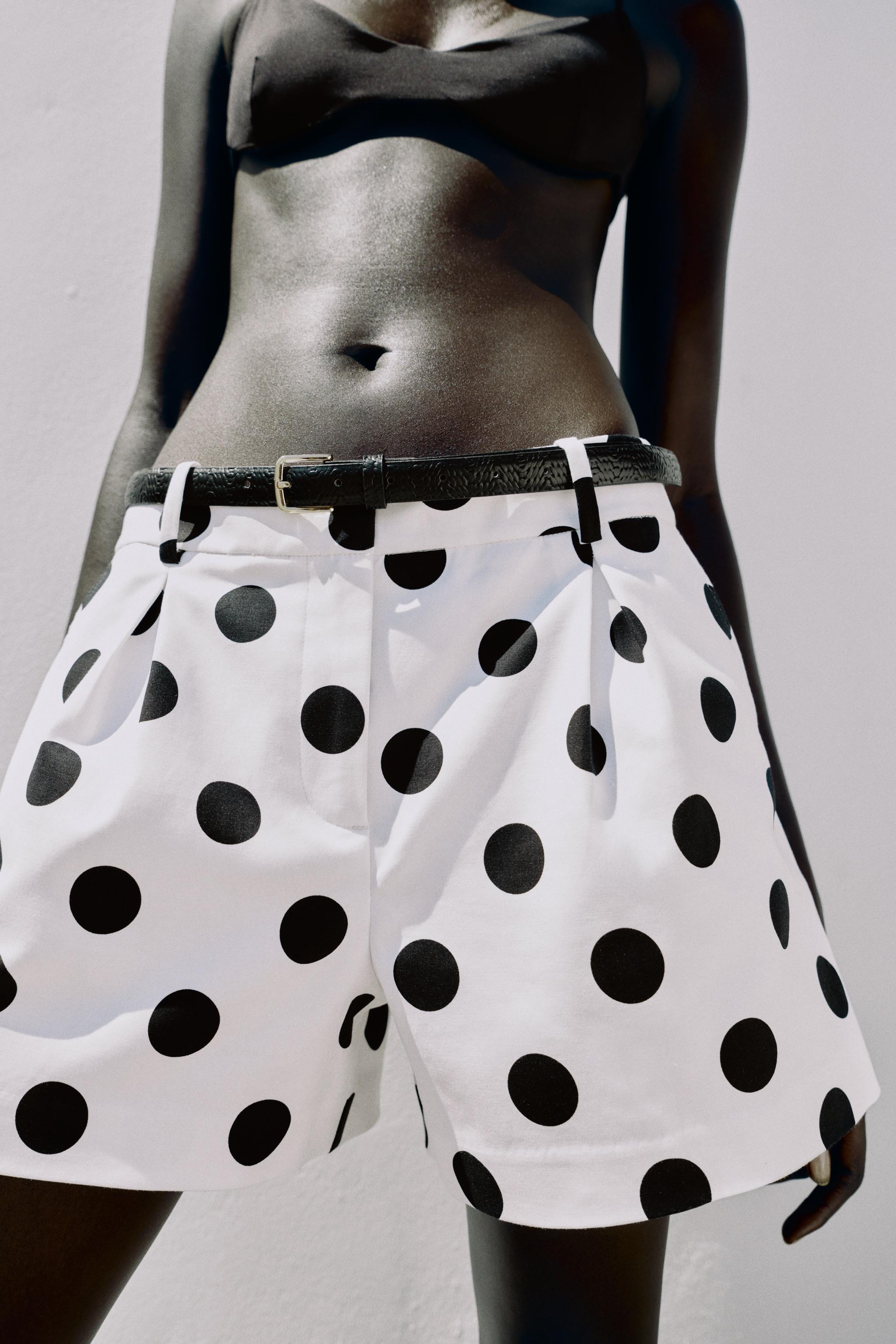 Mid-rise shorts with front pleats and belt. Front pockets and false back welt pockets. Front zip,... | Zara US