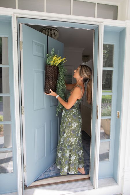 Looking to add a touch of coastal farmhouse aesthetic to your home decor in 2023? Our Indoor/Outdoor 17" Woven Door Basket is the perfect choice! This decorative floral arrangement will impress your guests as soon as they arrive. It includes a fade-resistant basket and a rust-resistant over-the-door hook, ensuring long-lasting beauty and durability. Plus, with its woven design and measurements of 18-1/2" x 9-1/4" x 5", it's compatible with doors up to 1.875"W and can support up to 15 lbs. Whether you use it indoors or outdoors, this basket will add a charming appeal to your space. Don't miss out on this furniture piece that will level up your home decor - click to find more home decor ideas now!