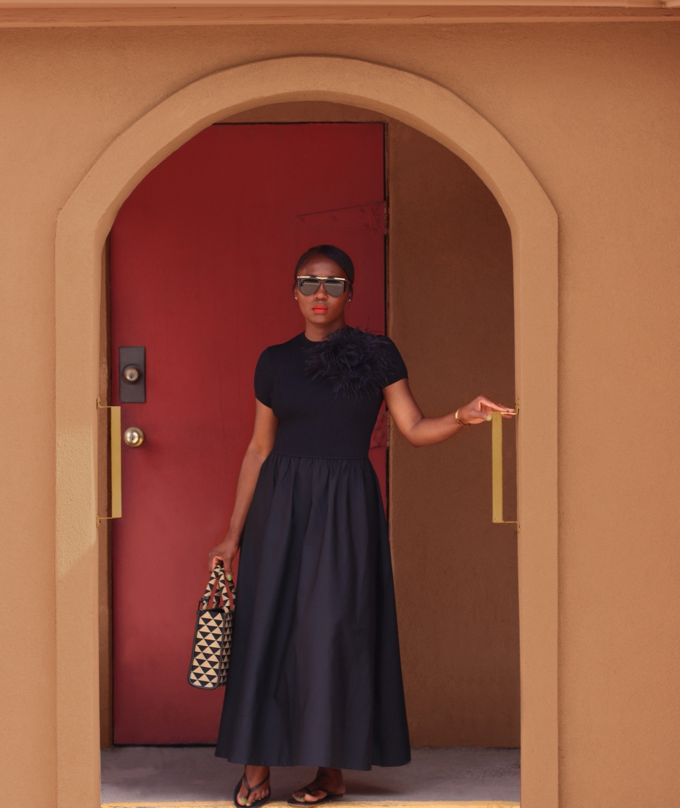 Picking up where I left off to share this casual spin on a classic dress. The perfect piece to wear now and seamlessly transition into the fall season. All pieces are available via @Saks.