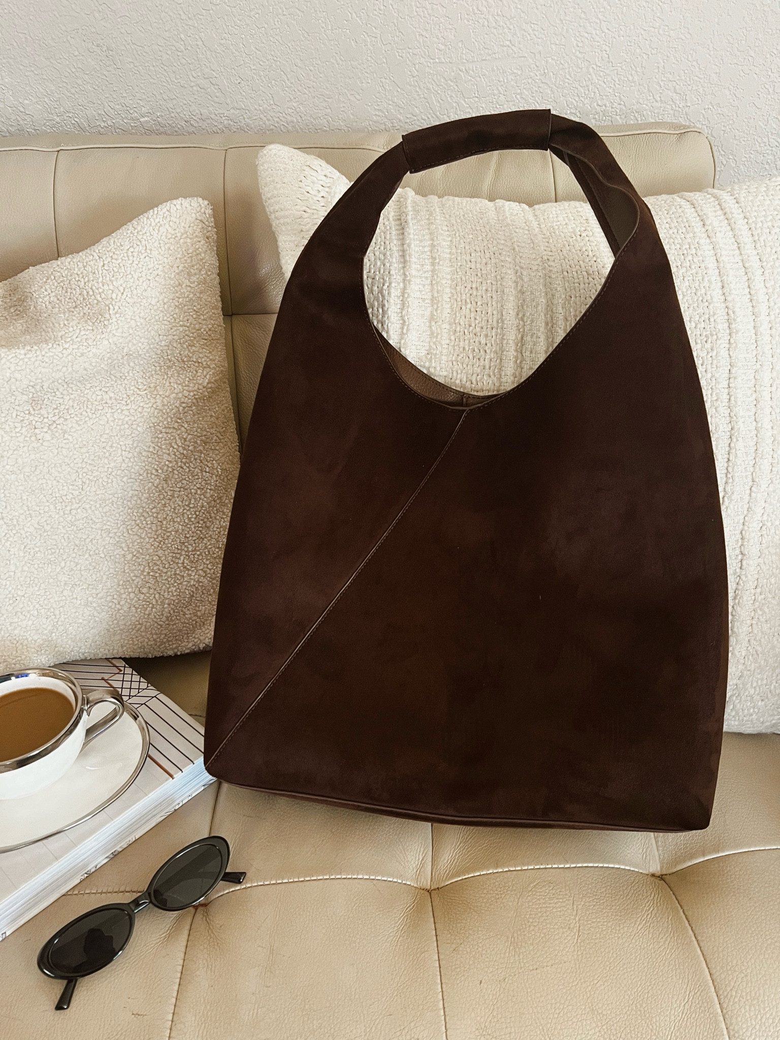 Absolutely obsessed with this vegan leather, suede, oversized bag! I’ve been wearing it with everything for the last four days! Love how it structured, but still soft and the quality is amazing! Perfect for fall!

#LTKFindsUnder100 #LTKFallSale #LTKStyleTip