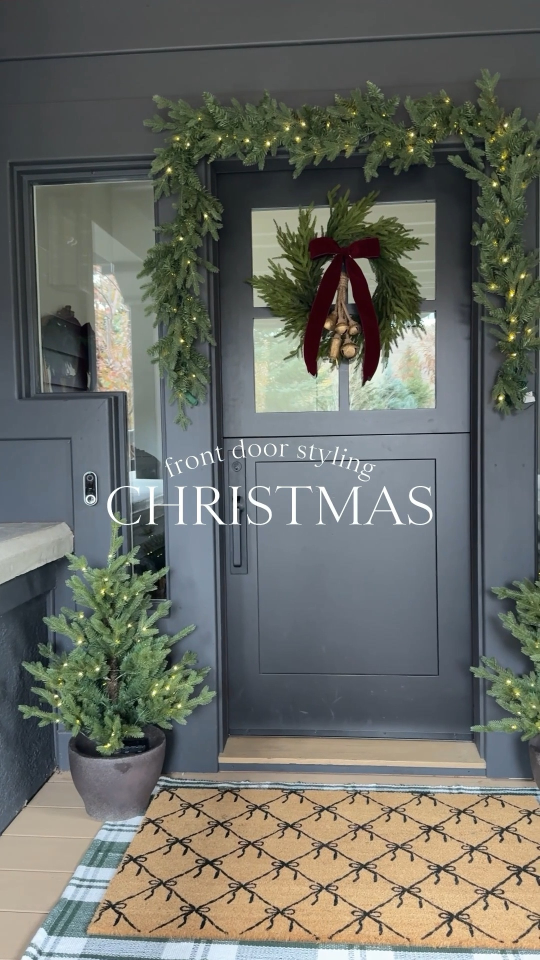 Classic Christmas front door styling🤶🏻💫Here is how I decorate my entry using the following👇🏻
+ plaid rug
+ bow oversized doormat $29
+ mini pre-lit Christmas trees
+ bells
+ 26” wreath $39
+ burgundy velvet bow
+ one pre-lit 9’ garland
+ command cords 

#LTKHome #LTKFindsUnder50 #LTKHoliday