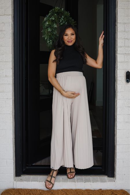 Maternity outfit that’s super comfortable and great when not pregnant too. Wearing a mockneck top, pleated pants and gladiator sandals. 

#LTKbump #LTKshoecrush #LTKstyletip