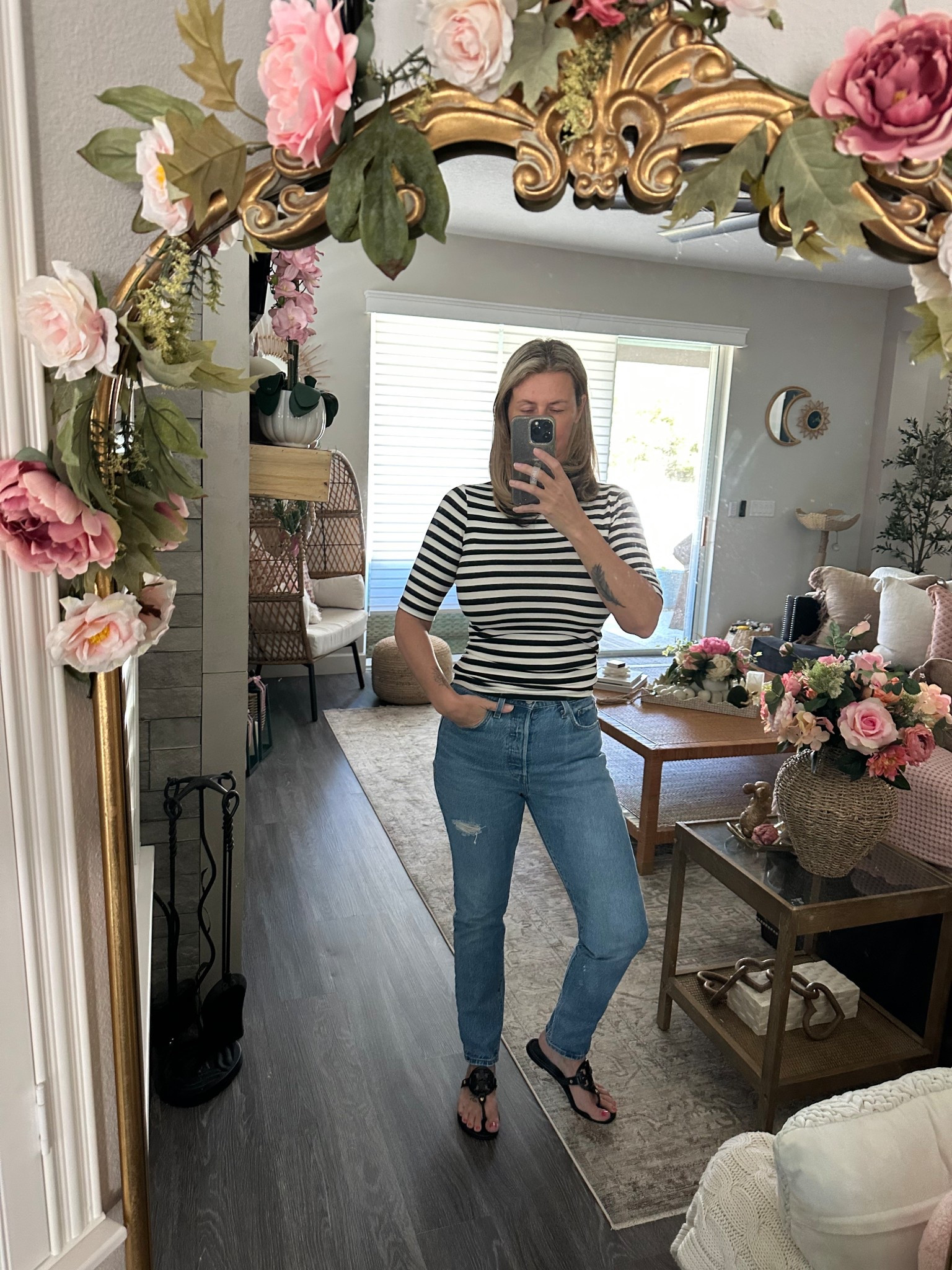 I don’t know why I own a ton of red and stripes lol, then forget my love for Levi’s jeans 501 S is my go to. Own tons of them #jeans #wiw #ootd #dailystyle #sandals #stripedtee #springstyle #501 #archedmirror #coquette #garland #floralgarland #springddcor #skinnyjeans #levissale 

#LTKSaleAlert #LTKStyleTip #LTKOver40