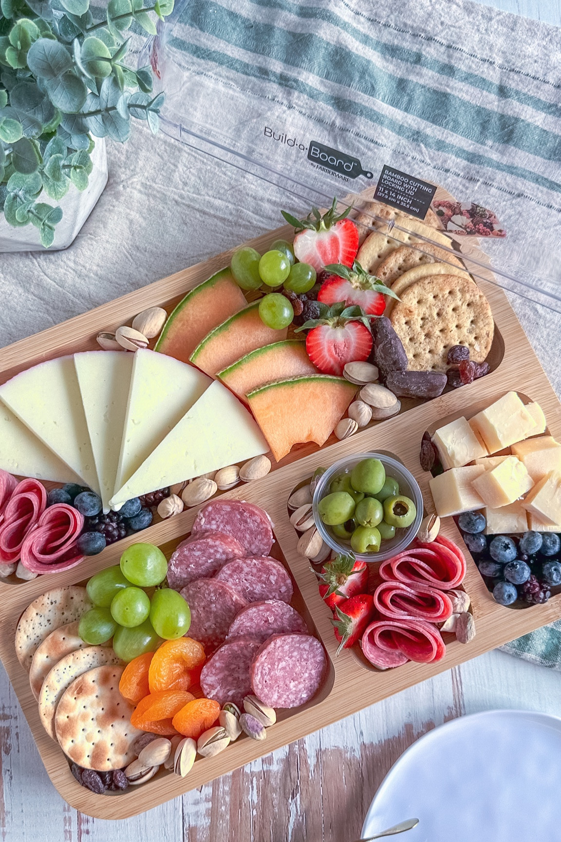 Elevate your entertaining game with the Farberware 11" x 14" Build a Board Charcuterie Bamboo Board with Lid! Perfect for cheese, charcuterie, and appetizers, this versatile board is designed for both style and functionality.


#LTKParties #LTKSeasonal #LTKHome