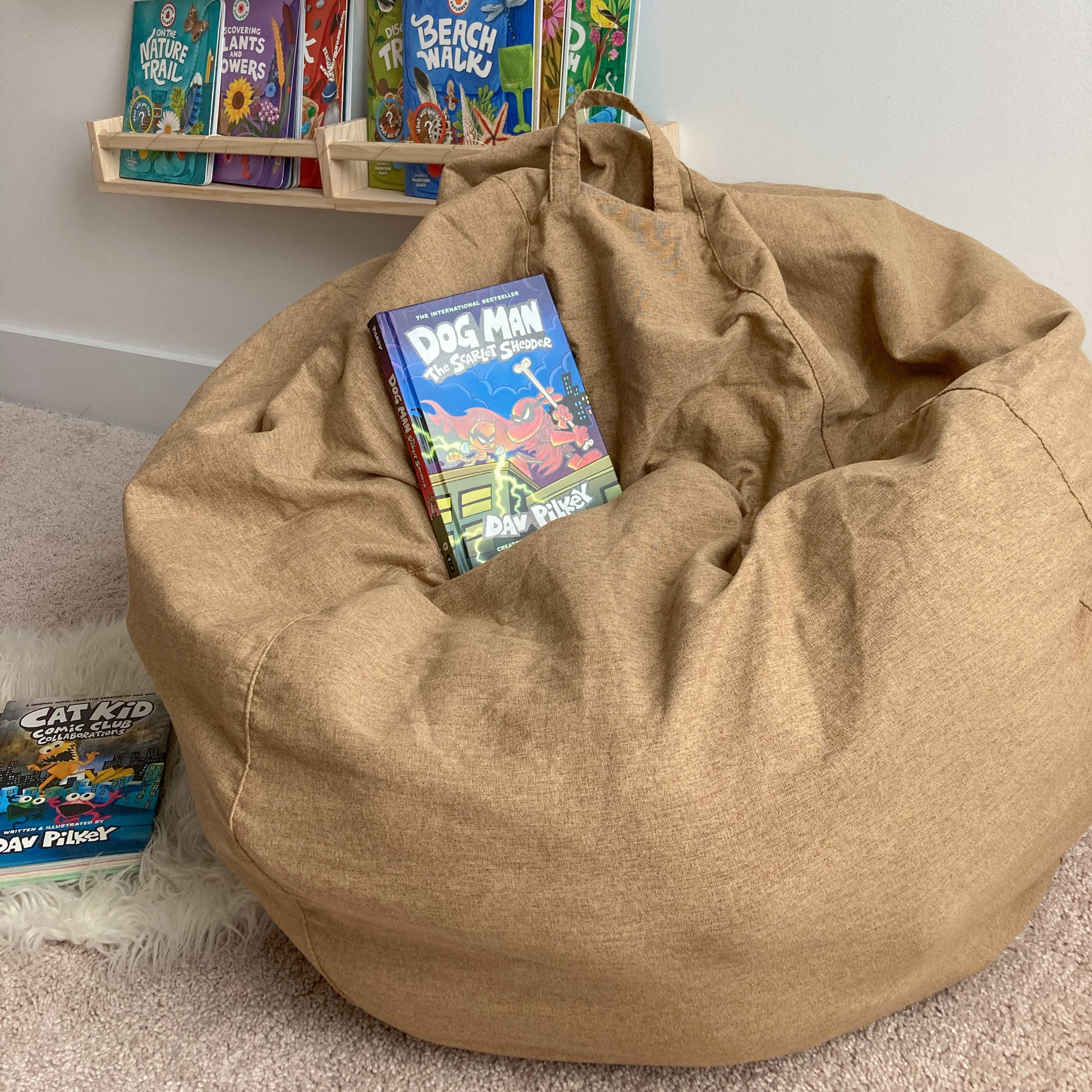 Multipurpose home items? Yup, I’ll take it.
This bean bag chair also doubles as stuffed animal storage! This is the medium size, and has 24 stuffed animals in there! It’s made of a thick canvas/linen fabric and has a handy handle o top so the kids can drag it from the reading book out to the living room for movie night with ease. 
I love love love that allllll these stuffed animals are out of sight!

#LTKOver40 #LTKFindsUnder50 #LTKHome