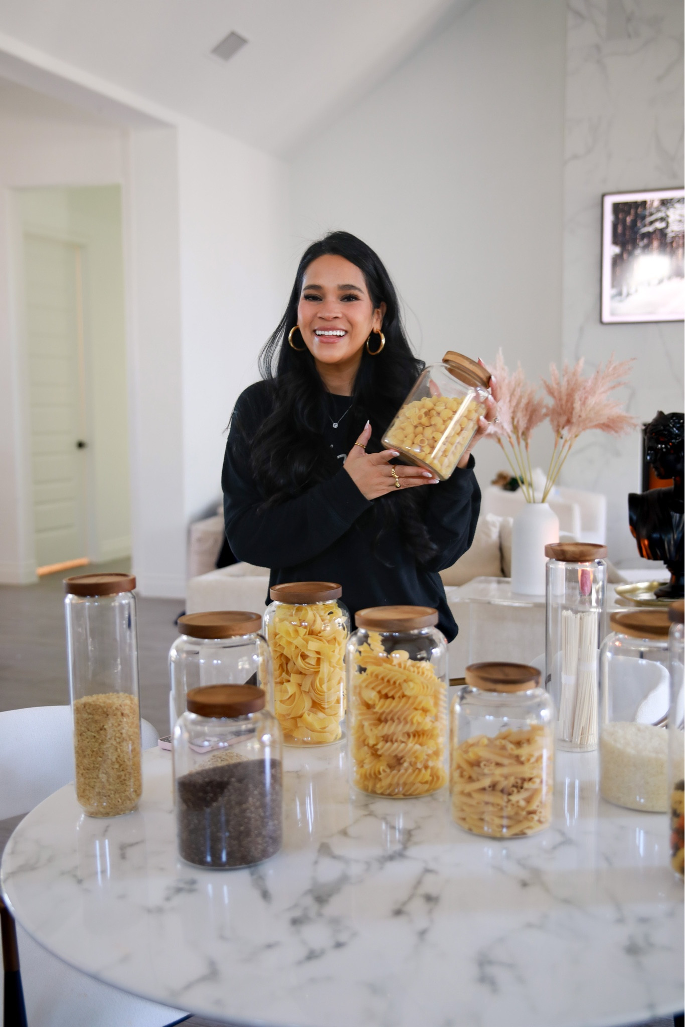My favorite glass storage jars with wood lid for dry goods like pasta and rice! They keep everything fresh and also aesthetically pleasing. 
#pantry #pantrylrganization #organization

#LTKFind #LTKunder50 #LTKhome