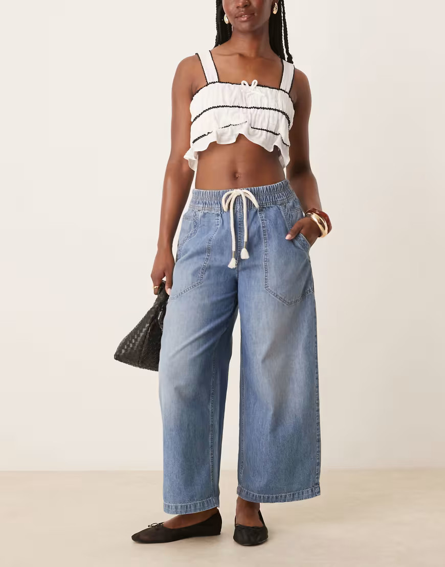 Free People tie-detail barrel leg pull-on jeans in mid wash blue | ASOS (Global)