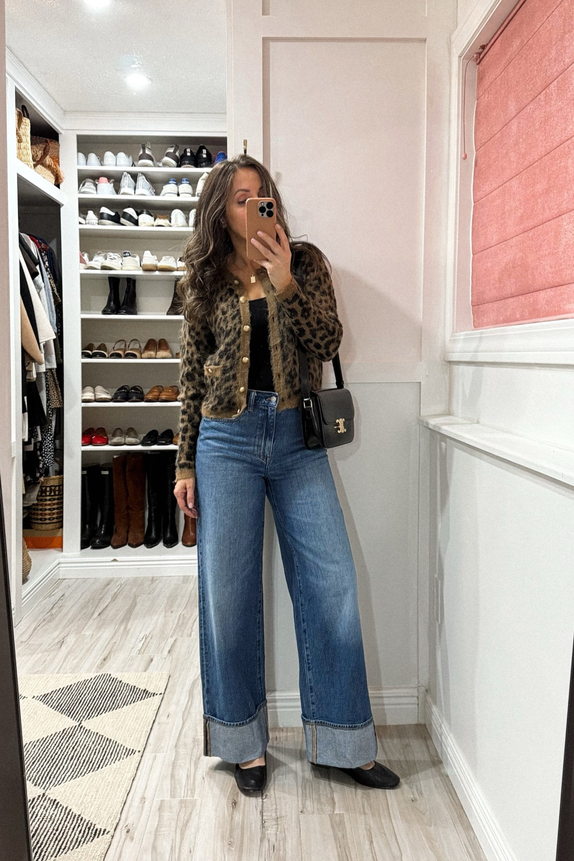 Leopard cardigan runs small - I took my bigger size.  I find it a bit itchy when I wear it just with a tank top.  
Cuffed wide leg Jeans tts but I sized up. 
Flats true to wise.  

#LTKStyleTip #LTKOver40 #LTKCyberWeek