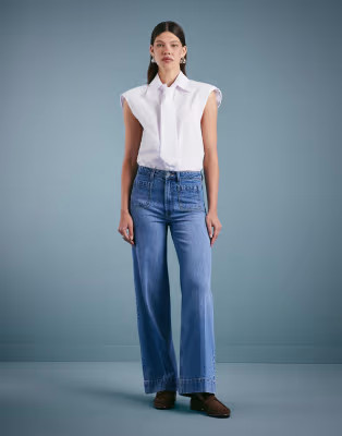 ASOS DESIGN high rise wide leg jeans with front pockets in mid blue | ASOS (Global)