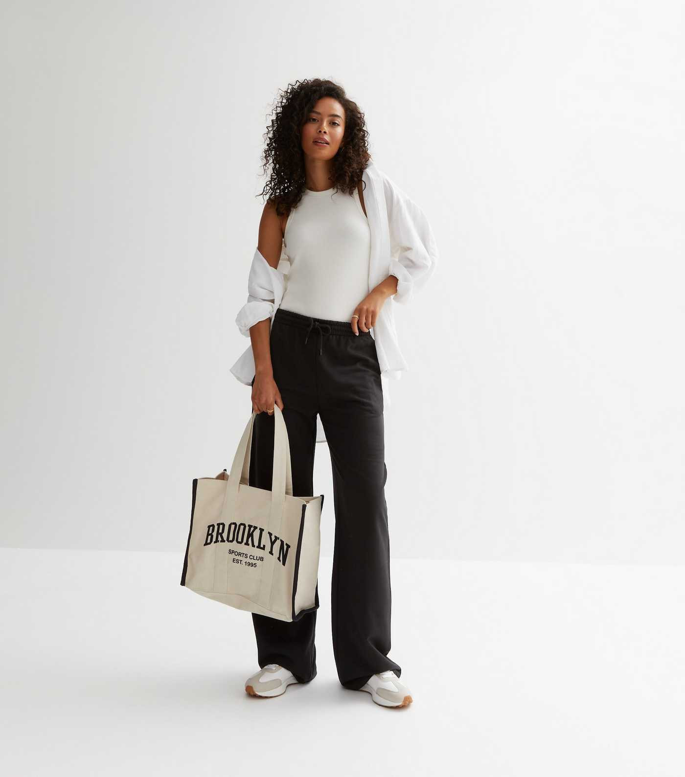 Tall Black Ripple Ribbed Wide Leg Trousers
						
						Add to Saved Items
						Remove from Save... | New Look (UK)