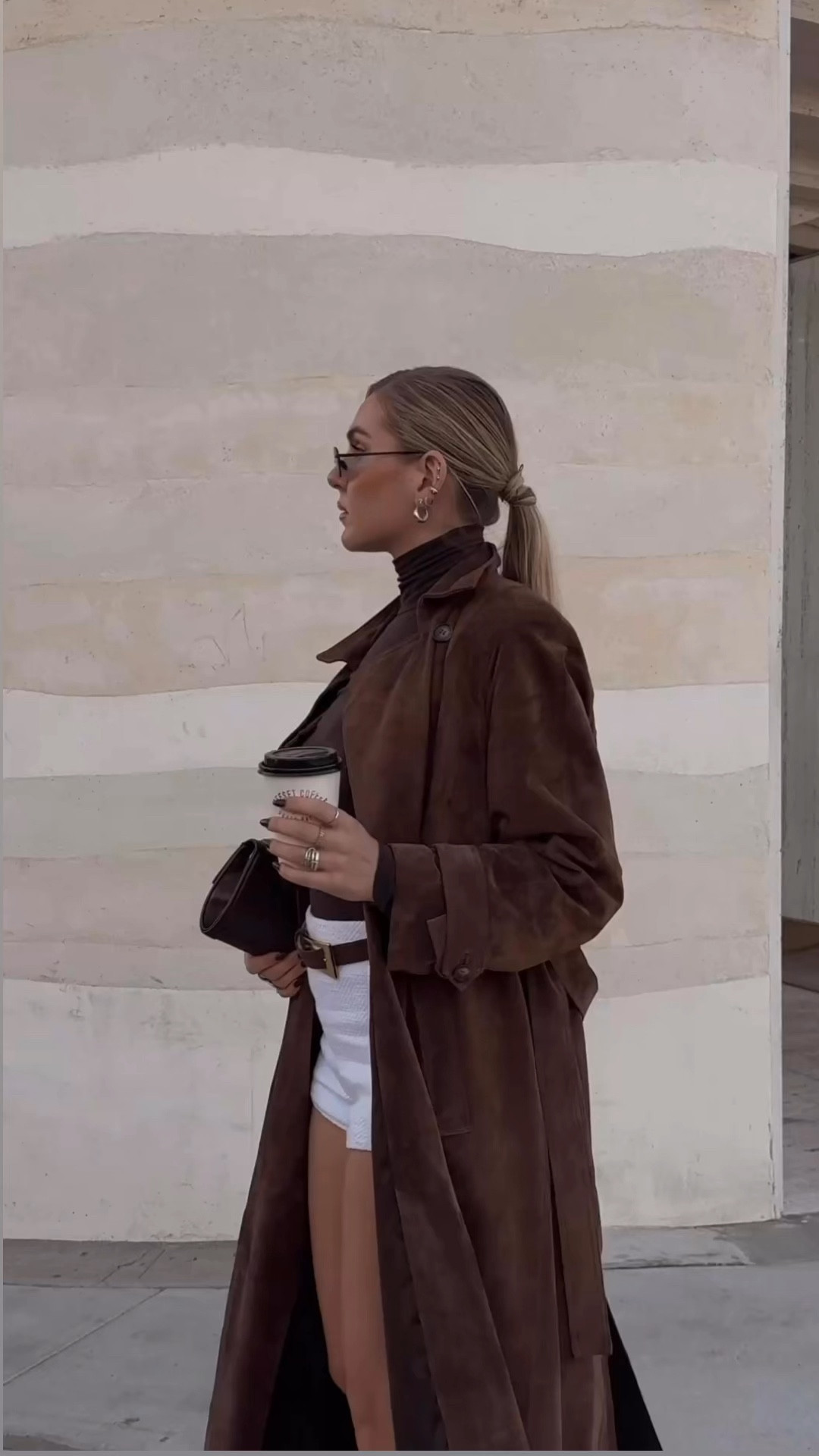 Brown trench coat and her accessories 

#LTKStyleTip