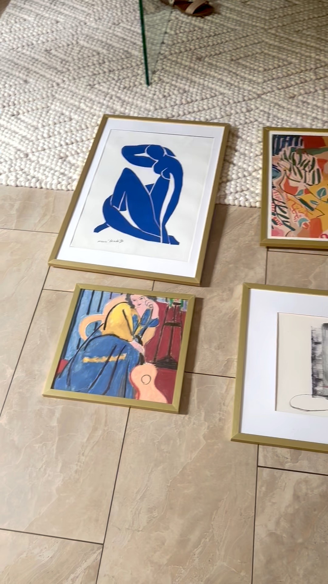 Before we hung Julie’s gallery wall we spaced it out on the floor trying different combinations and placements.  The prints are from Etsy and the gold frames are from Amazon.  We did some repeated colors to tie it together.  

#LTKFindsUnder50 #LTKHome