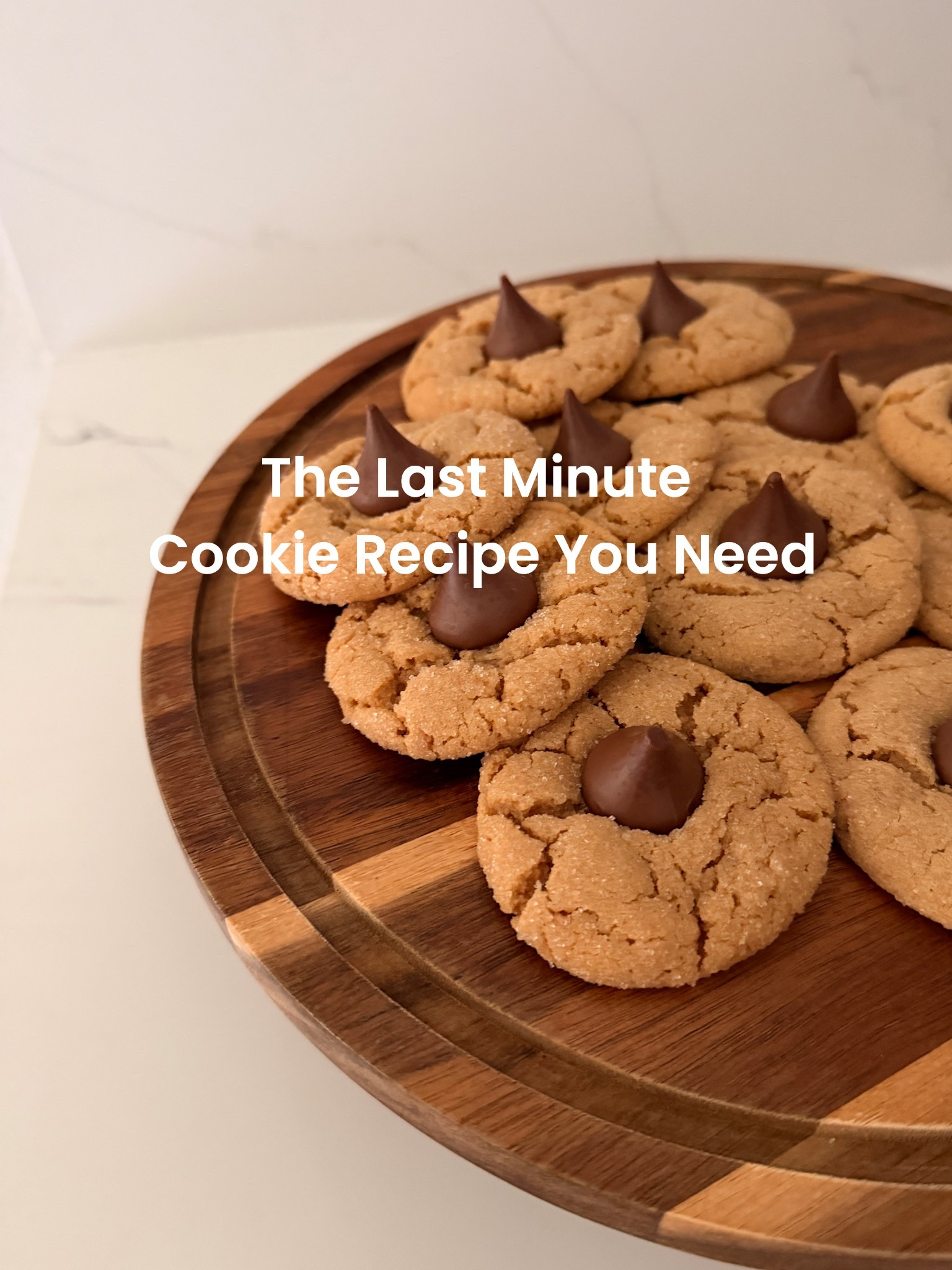 Hands down the easiest and most delicious cookie recipe you need for Christmas. Last minute target pickup and you are all set! 

Mix the ingredients according to the peanut butter cookie package. 
Roll the dough in to balls, roll them in sugar, and place them on a baking sheet. (Do not press them down)
Bake the cookies 10-12 minutes. 
While your cookies are baking, unwrap a bag of Hershey’s kisses. 
Pull out the cookies, pressing a kiss in the center of each ball. 
Let them cool on the cookie sheet. 

#LTKmomlife #LTKGiftGuide #LTKHoliday