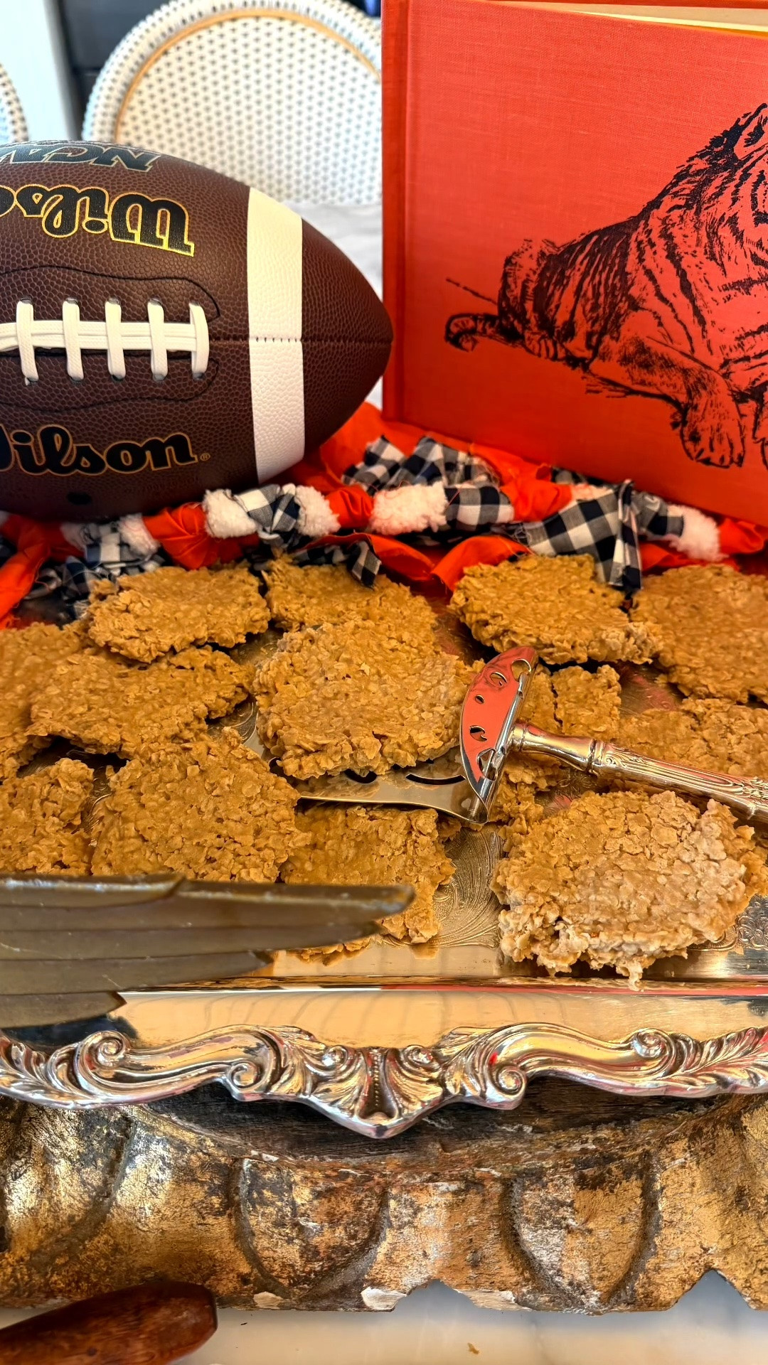 🦅 Auburn Eagle’s Nest No-Bake Peanut Butter Cookies

This is my husband’s recipe, and it’s one our family and friends ask for over and over again! Sweet, peanut buttery, and made with oats, these cookies are perfect for sharing on game day. War Eagle! 🧡💙

Prep time: 25 minutes
Cook time: 5 minutes
Makes: About 30 cookies
Ingredients:
* ½ cup unsalted butter, cut into pieces
* 1¾ cups granulated sugar
* ½ cup milk
* ¾ cup creamy peanut butter
* 1 teaspoon pure vanilla extract
* 3¼ cups quick-cooking oats

Directions:
1. Line two baking sheets with parchment paper.
2. Add the butter, sugar, and milk to a saucepan over medium heat. Stir as the butter melts, then bring the mixture to a full rolling boil.
3. Boil for 1 minute, then remove the pan from the heat. Stir in the peanut butter and vanilla until smooth.
4. Stir in the oats until evenly coated. Working quickly, drop spoonfuls onto the prepared baking sheets.
5. Let the cookies cool until set, then enjoy!

Save this recipe for your next game day—and let me know if your family loves them as much as ours does! ~xxAP

#LTKfoodie #LTKU #LTKmomlife