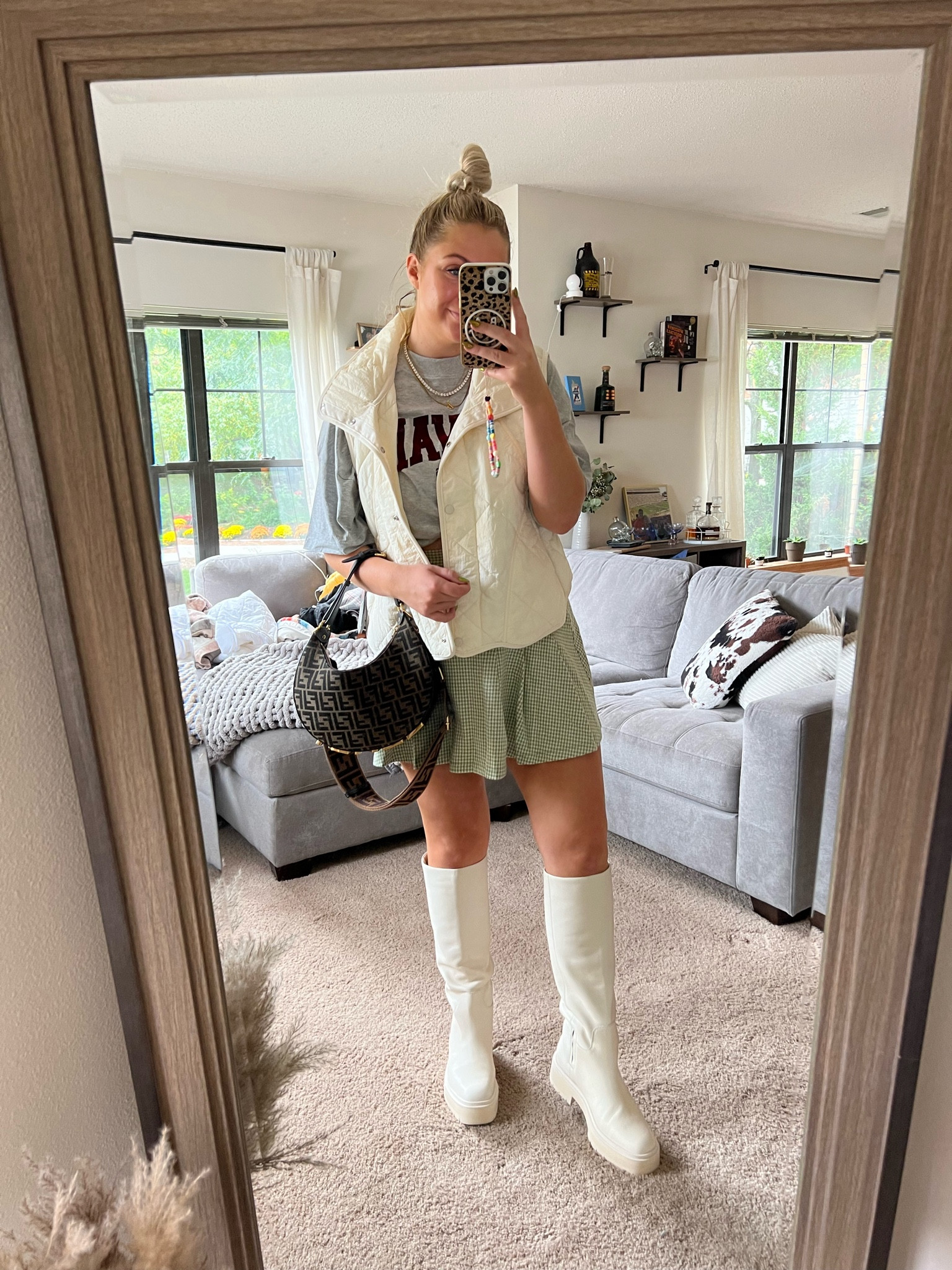 Medium in puffer and 10 in the skirt. Perfect fall outfit 