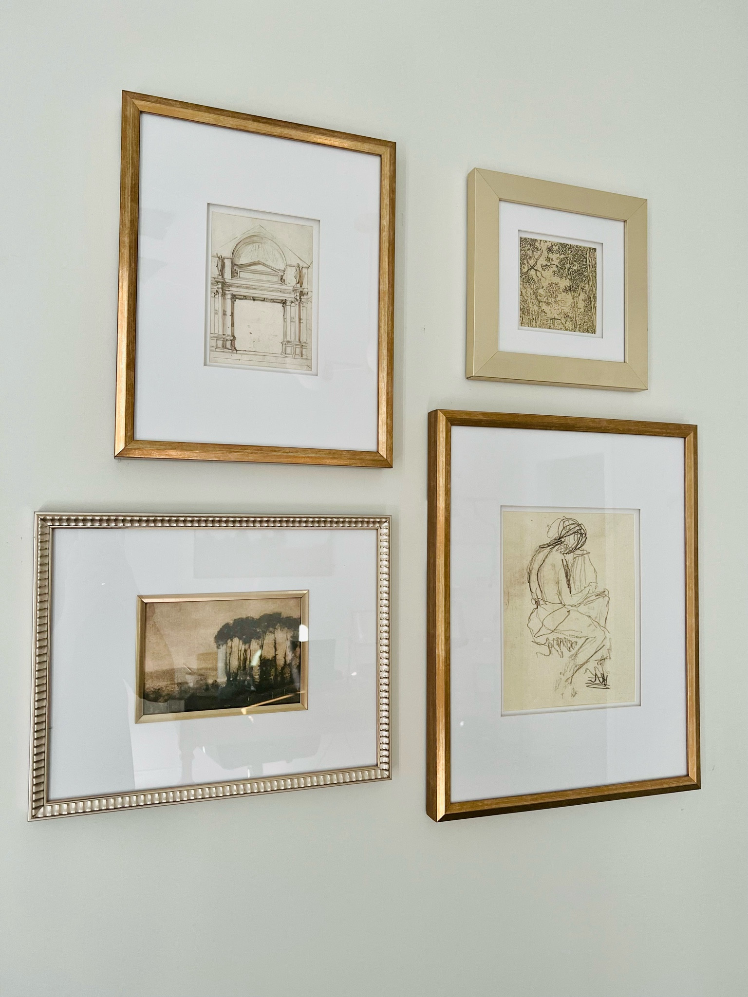 Small gallery wall of frames with vintage prints! Mix and match your frames. 


#LTKhome #LTKFind