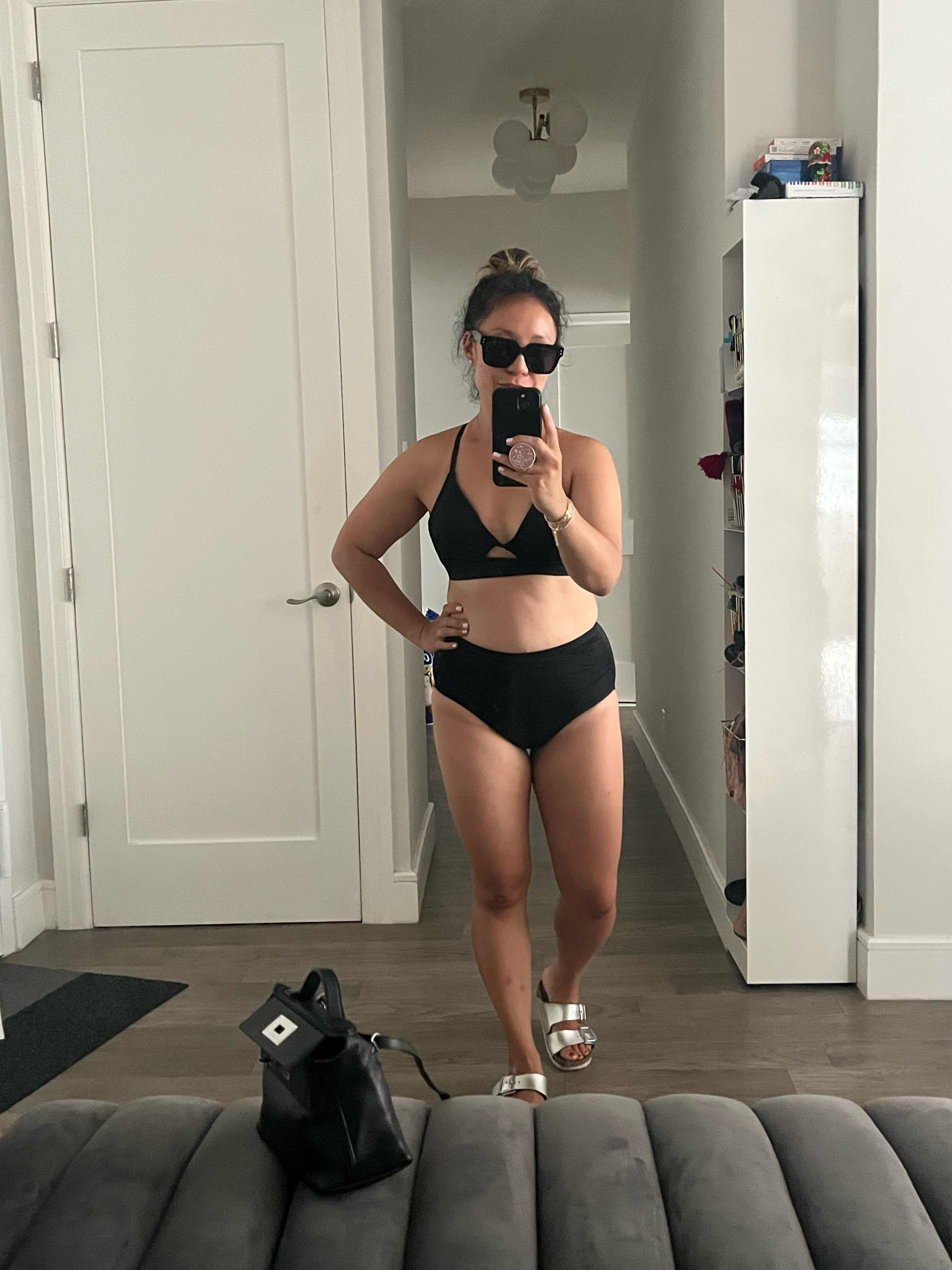 High-waisted black bikini. I’m wearing an xs in the bottoms and a 32C n top. I love the ruching at the sides and the peek-a-boo top. Top is lined and adjustable.

#LTKTravel #LTKFindsUnder50 #LTKSwim