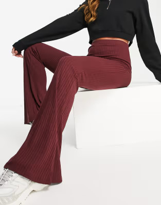 ASOS DESIGN rib flare pant in oxblood | ASOS (Global)