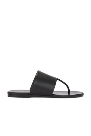 The Row Signum Flat Sandal in Black - Black. Size 39.5 (also in 36, 38.5). | FWRD 
