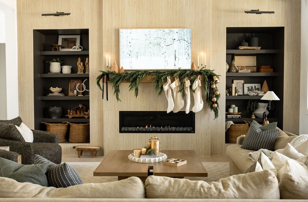 Our holiday mantel and Living Room Christmas styling this year ✨🌲Filled with textured greens, cream stockings, candlesticks, and organic Christmas accents. This whole room leans into modern classic Christmas decor, warm neutrals, and minimal winter styling that still feels festive. Great for anyone searching for living room Christmas inspiration, holiday mantel ideas, neutral Christmas decor, or Amazon holiday home finds. #familyroom #christmas #decorrating

#LTKSeasonal #LTKHome #LTKHoliday