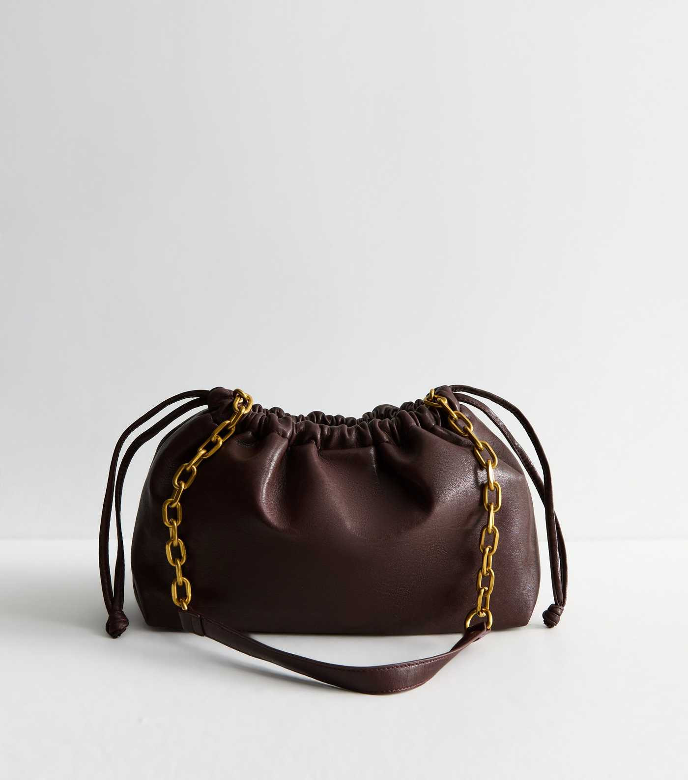 Dark Burgundy Faux Leather Drawstring Chain Strap Crossbody Bag | New Look | New Look (UK)