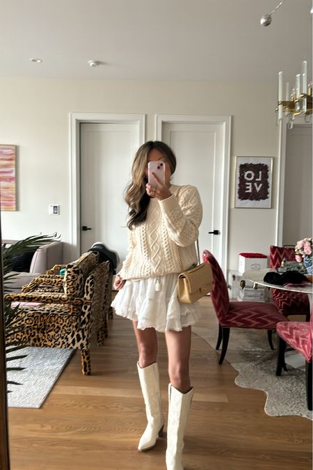 Amazon cable sweater, Amazon finds, white skirt, cowboy boots, knee high boots, fall style, Nashville style , sweater wearing a medium 

#LTKfindsunder100 #LTKstyletip #LTKshoecrush