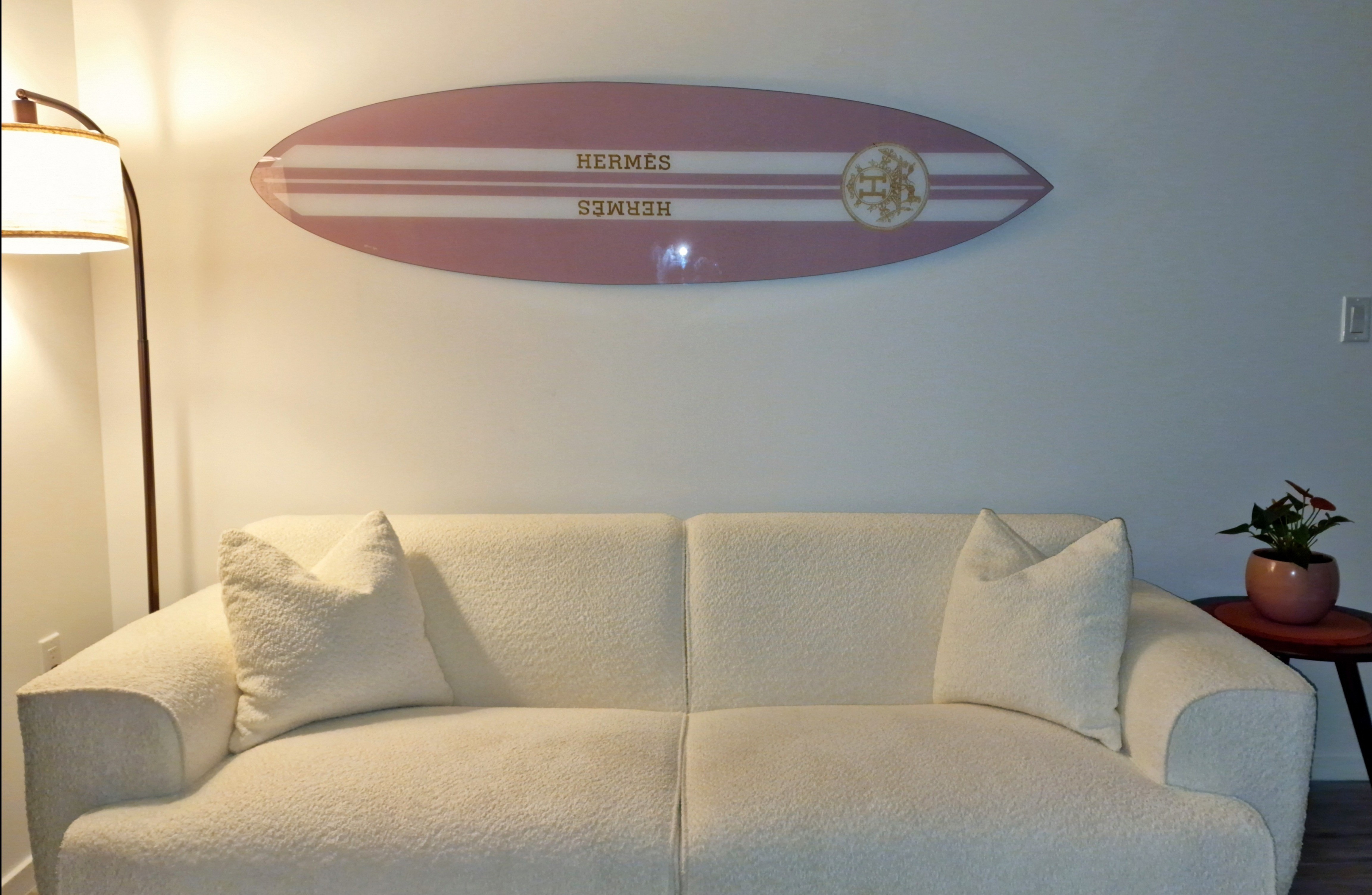 I was looking for a cozy sofa that was also super comfortable - and I'm so glad I went with this one! Also love my Hermes surfboard, it's a statement piece without overwhelming the space.

#LTKhome