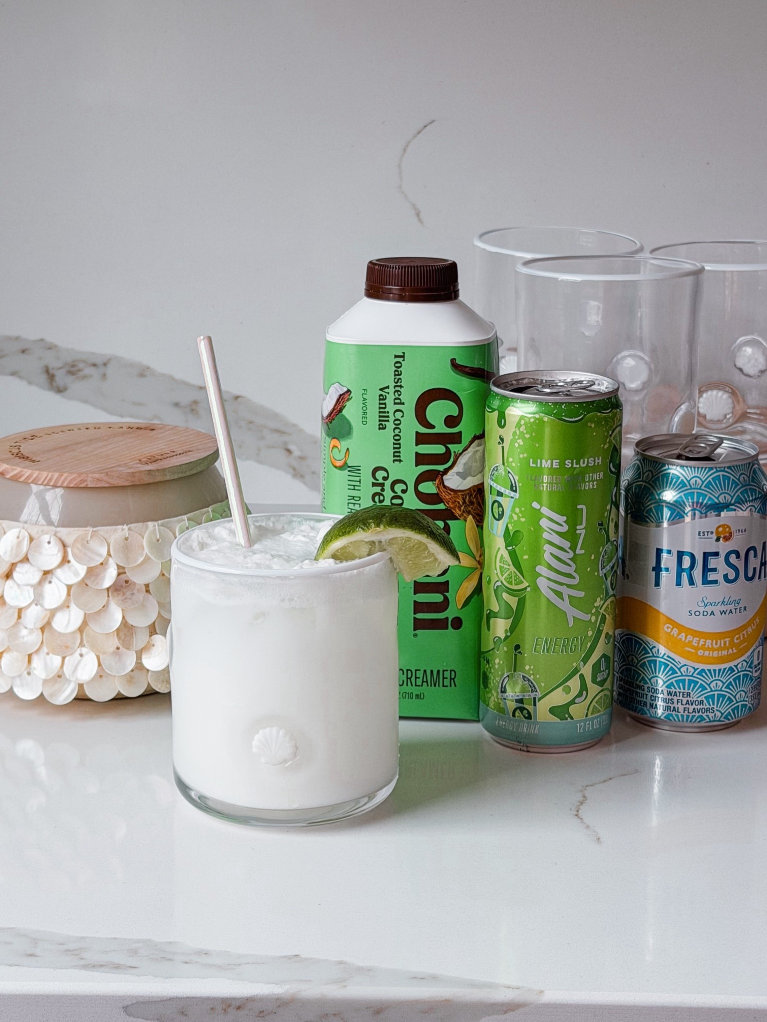 The most delish dirty soda for paradise. 
🍋‍🟩🥥🌴🐚

Lime slush Alani, Chobani Toasted Coconut Creamer and Fresca. Garnish with coconut flakes and a lime!

#LTKfoodie #LTKmomlife #LTKdayinmylife