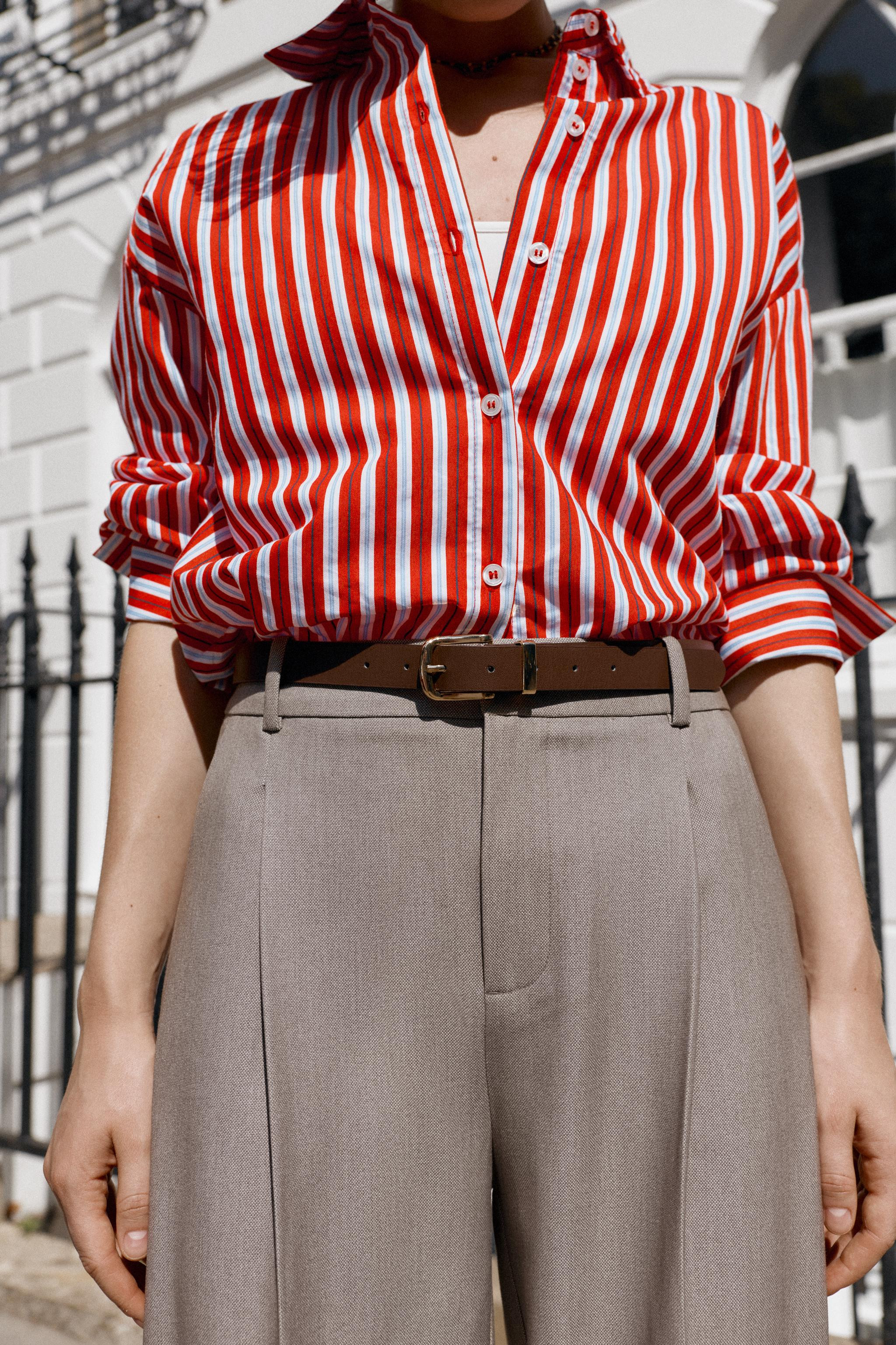 Mid-rise ankle pants featuring a belt and front pleats. Front pockets and back faux flap pockets.... | Zara US