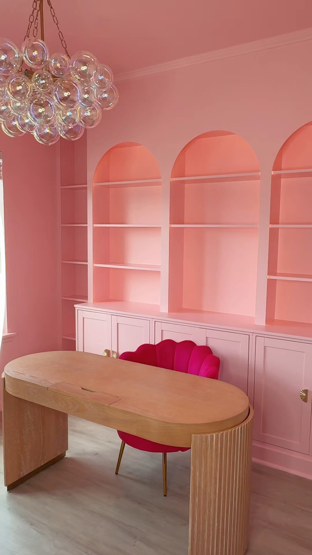 Pink home office makeover 💖✨ Pink scalloped desk chair, modern wood desk, statement bubble chandelier & whimsical office decor for a fun, whimsical office ✨

#LTKHome