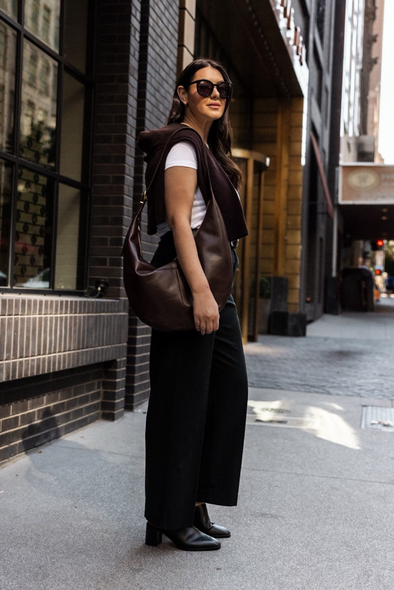 This bag is an absolute favorite for fall. The rich raisin hue and the shape is so unique. The size is perfect too — I can fit my 13” laptop in here and still zip it! 

Right now everything is 25% off at Madewell! Sign up for an account and save!