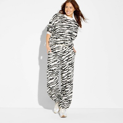 Women's Zebra Bat Print Fleece Graphic Jogger Pants - White XXS | Target