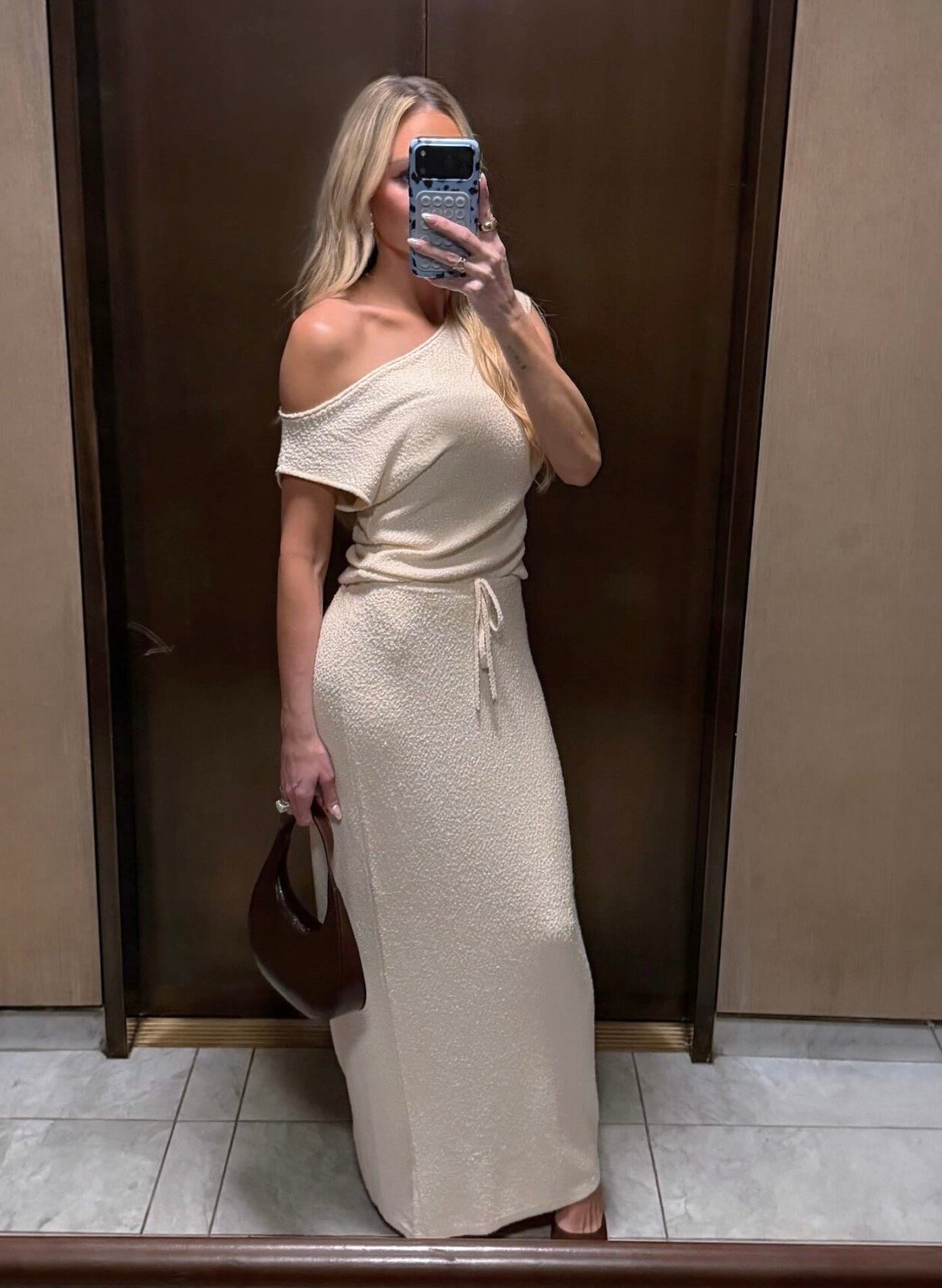 Britney Aldean wearing a super soft symmetric off the shoulder bouquet fabric top and matching textured knit maxi skirt  ￼