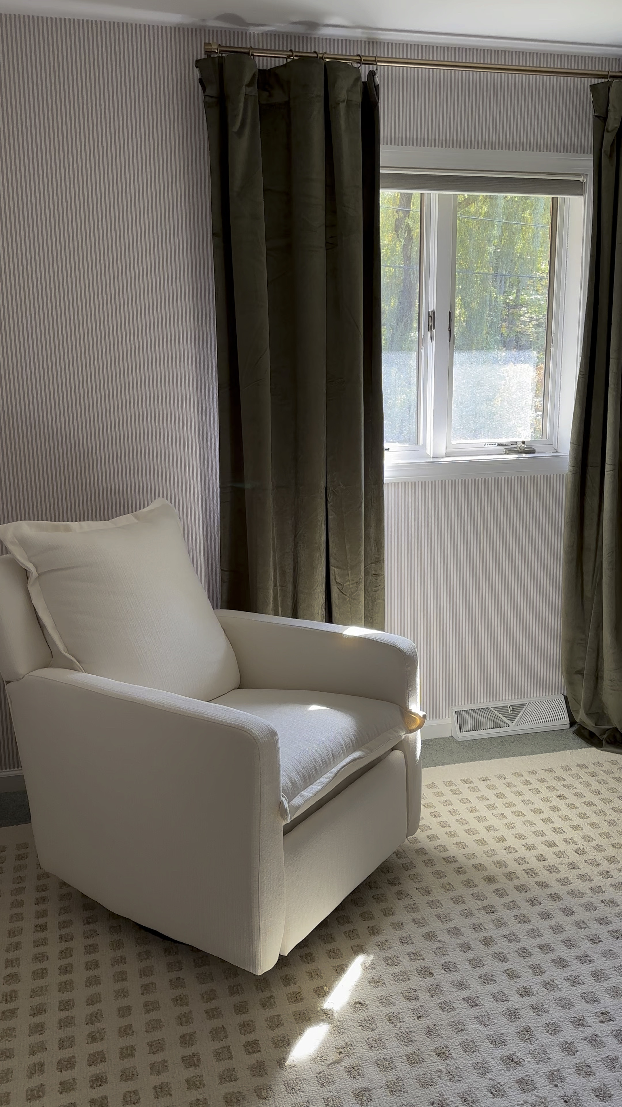 Nursery room glider 

Nursery, neutral nursery, neutral glider, velvet curtains, striped wall paper, loloi rugs, checkered rug, home decor, amazon, brass curtain rod, amazon home
