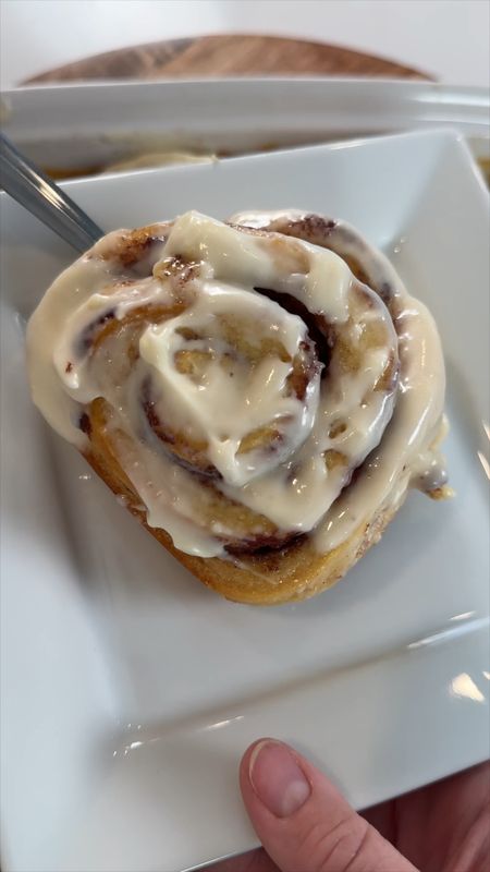 "Elevate your store-bought cinnamon rolls with just two simple tricks! 🌟 Pouring heavy cream before baking and swapping out the frosting for homemade cream cheese icing takes these treats to a whole new level of decadence. Find the full recipe on youngwildme.com. Try it out and indulge in the ultimate cinnamon roll experience! #CinnamonRolls #BakingTips #HomemadeTreats #CinnamonRollHack

#LTKhome #LTKVideo #LTKfamily