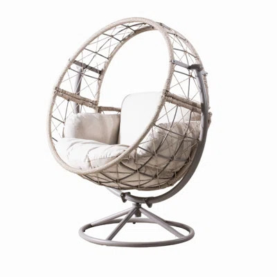 Outdoor Wicker Swivel Egg Chair with Cushions | Wayfair North America