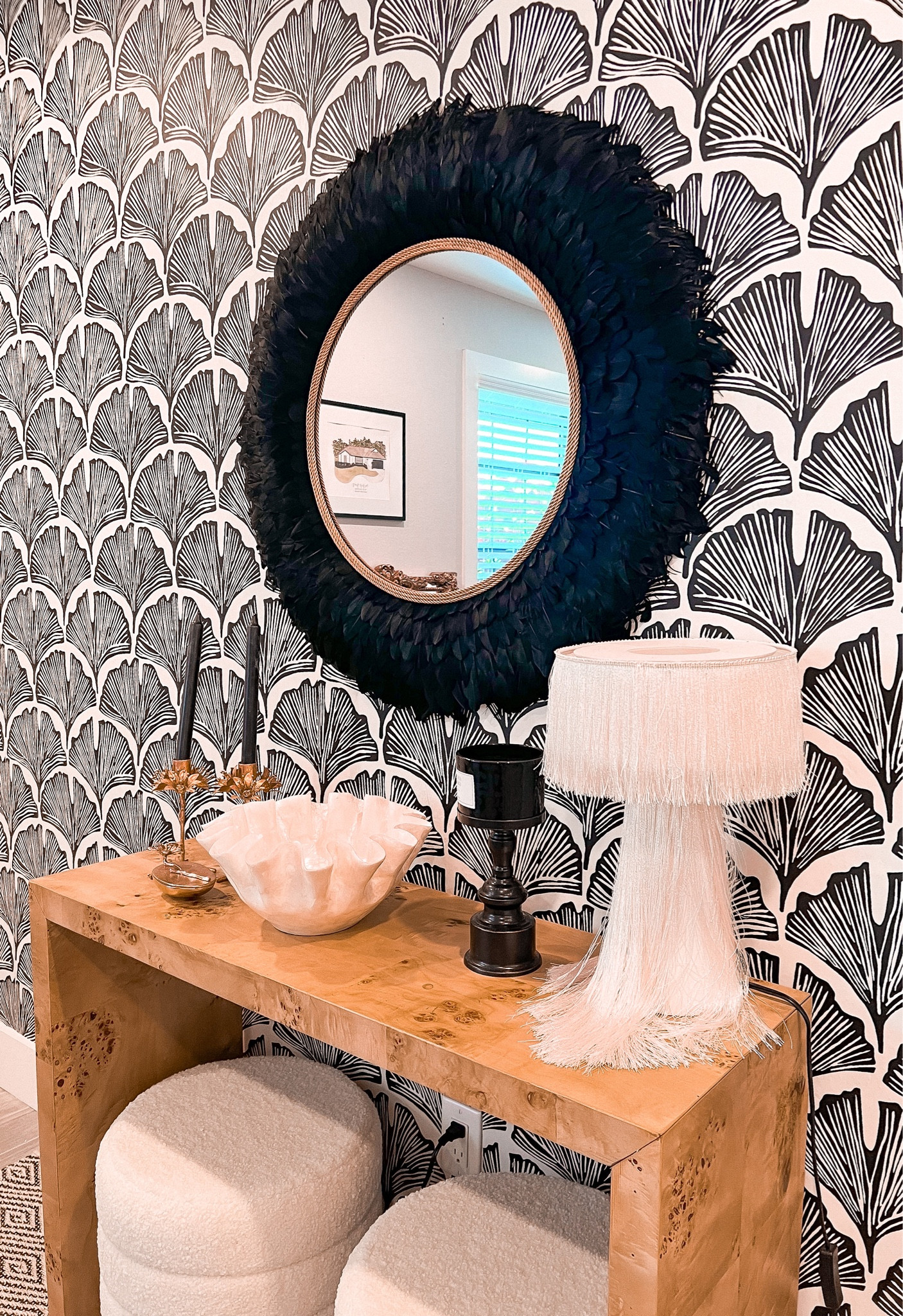 Neutral Entry Way Decor. Black and white wall paper, round feather mirror, marl wood console table, shell bowl, fringe lamp, candle stick holders and ottoman benches. 
Home decor, interior design, entryway, black and white. 

#LTKhome #LTKstyletip #LTKfamily