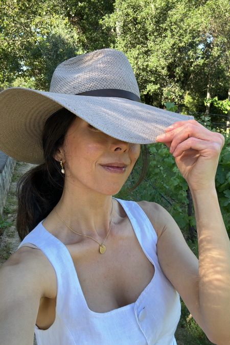 Packable sun hat. Love this taupe/beige color. I’m wearing a medium here. 
White linen vest. Wearing a size 2. 

Summer travel hat 
Summer outfit 
J.Crew linen vest 



#LTKOver40 #LTKSaleAlert #LTKTravel